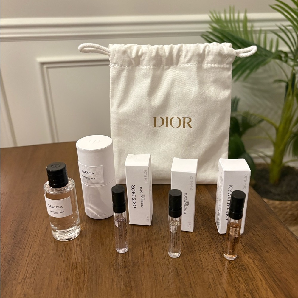 Dior Perfume Collection with Elegant White Bag